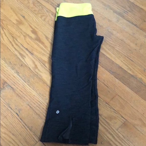 Black Heathered lululemon capris with yellow band - Picture 1 of 3